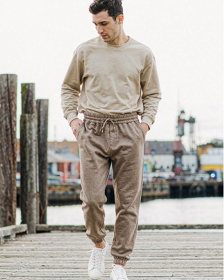 Cuffed Jogger in Stone worn by a model