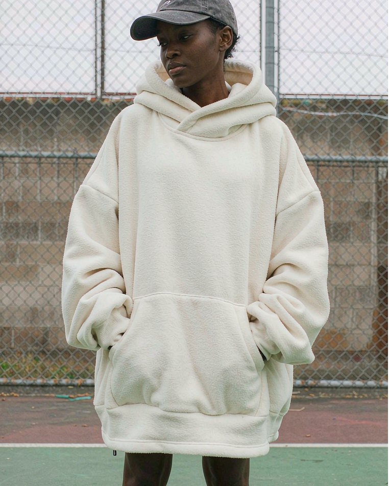 Oversized Hoodie in Off White worn by a model