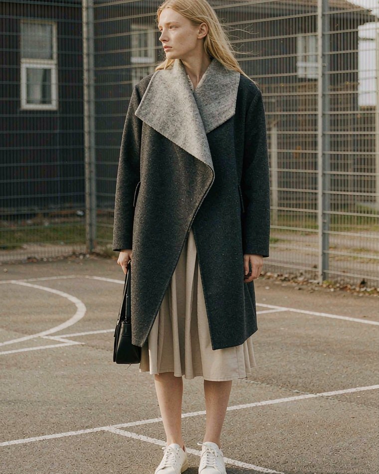 Split Overcoat in Charcoal Wool worn by a model