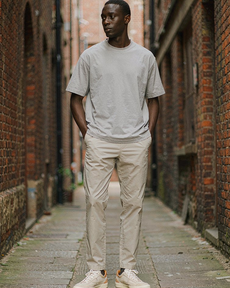 Suede Trainer in Sand Suede worn by a model